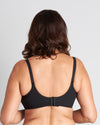 Model wears Comfit Collection Contour Bra in BLACK. On body back view