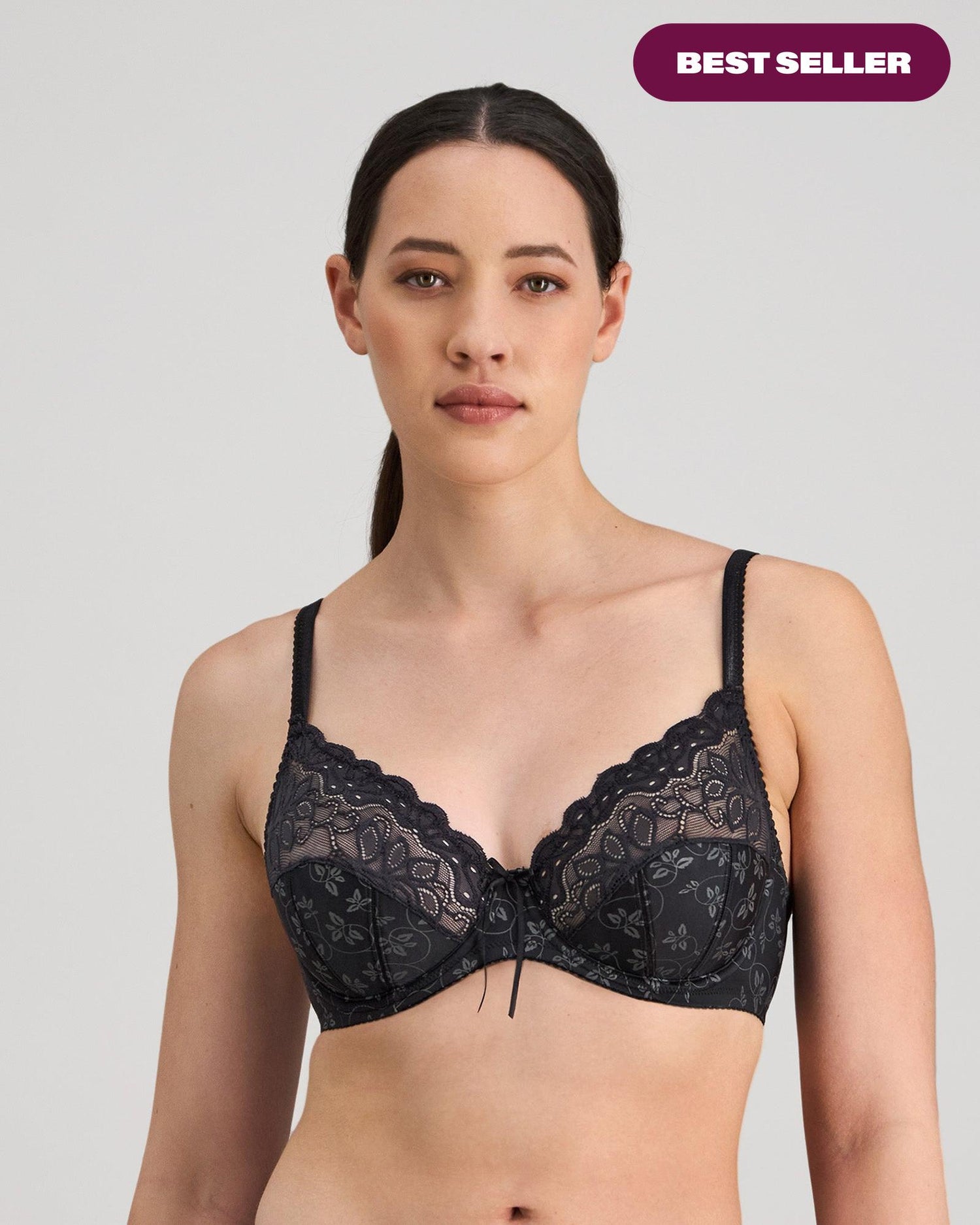 Model wears Yvette Underwire Bra in BLACK. On body front view
