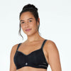 Model wears Active Contour Bra in BLACK. On body front view