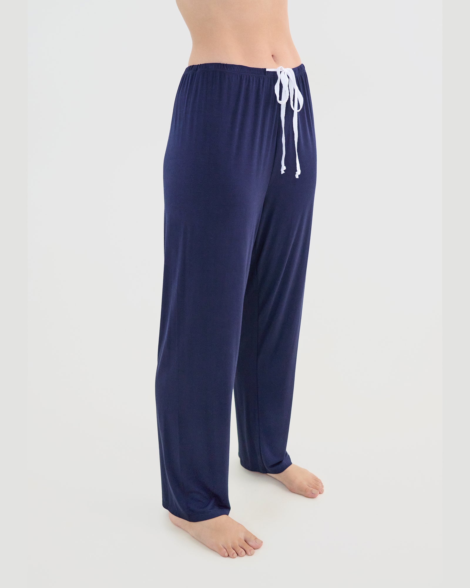 Model wears Bamboo Bliss Long PJ Pant in NAVY BLAZER. On body side view