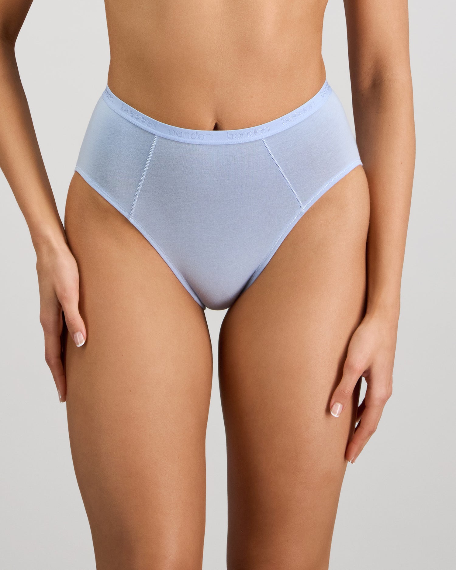 Model wears Body Cotton High Cut Brief in SKYWAY. On body front view