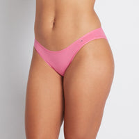 Model wears Clemence Bikini in IBIS ROSE. On body side view