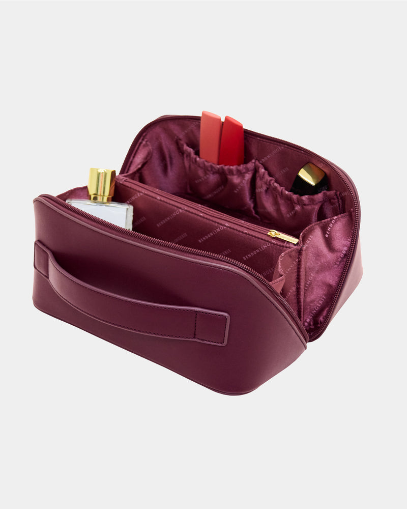 Model wears Cosmetic Case in FIG. On body front view