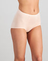 Model wears Body Cotton Full Brief Twin Pack in OXBLOOD RED/PEARL BLUSH. On body side view