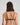 Model wears Adaline Contour Bra in BLACK FLORAL PRINT. On body back view