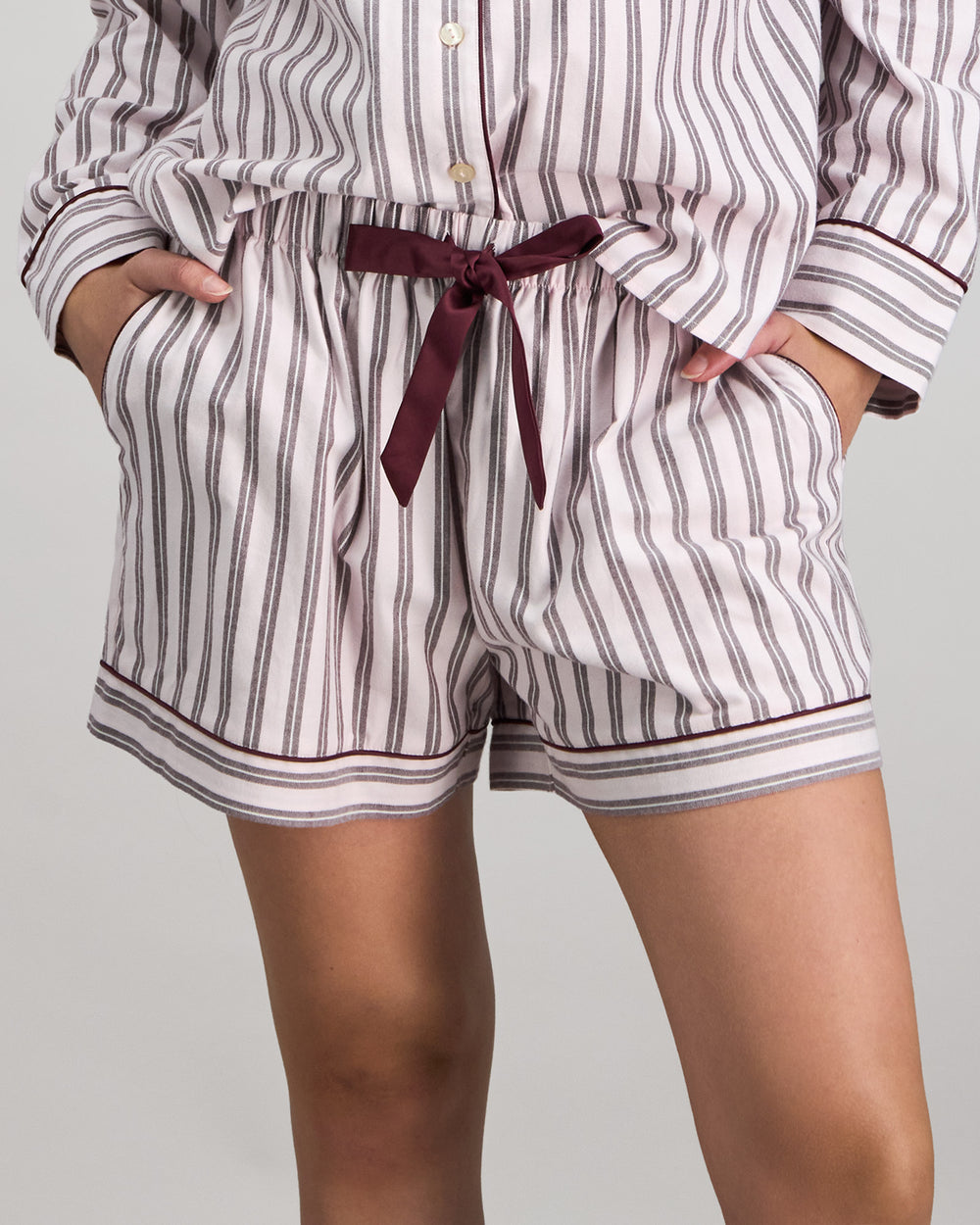 Model wears Cosy Flannel Short Pj in PINK-A-BOO. On body front view
