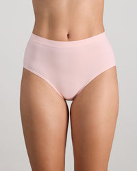 Model wears Seamless Soft Full Brief in ICY PINK. On body front view