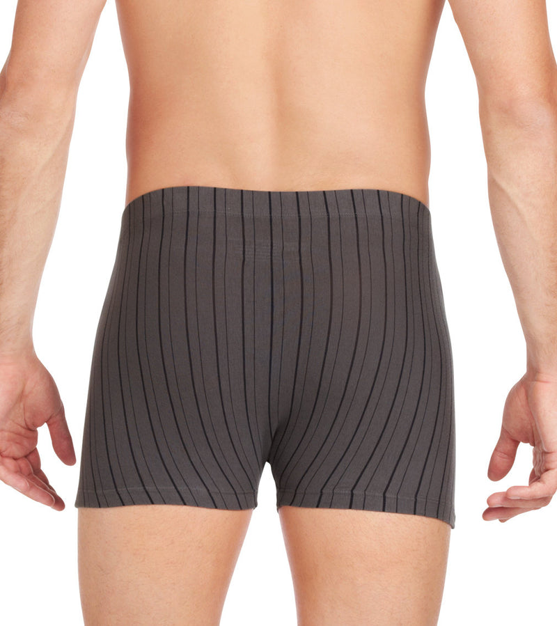 Model wears Cotton Stretch Mens Trunk in CHAR BLACK. On body back view
