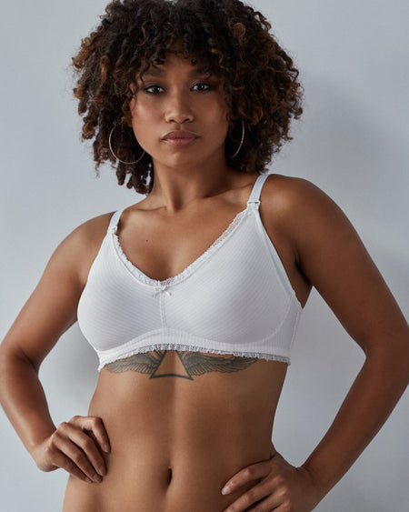 Model wears Elodie Maternity Bra in CRADLE PINK STRIPE. On body front view