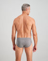 Model wears High Tech Cotton Mens Brief in GREY MARL. On body back view
