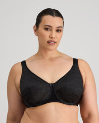Model wears Charlotte Underwire Bra in BLACK. On body front view
