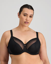 Model wears Faithful Underwire Bra in BLACK. On body front view