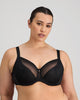 Model wears Faithful Underwire Bra in BLACK. On body front view
