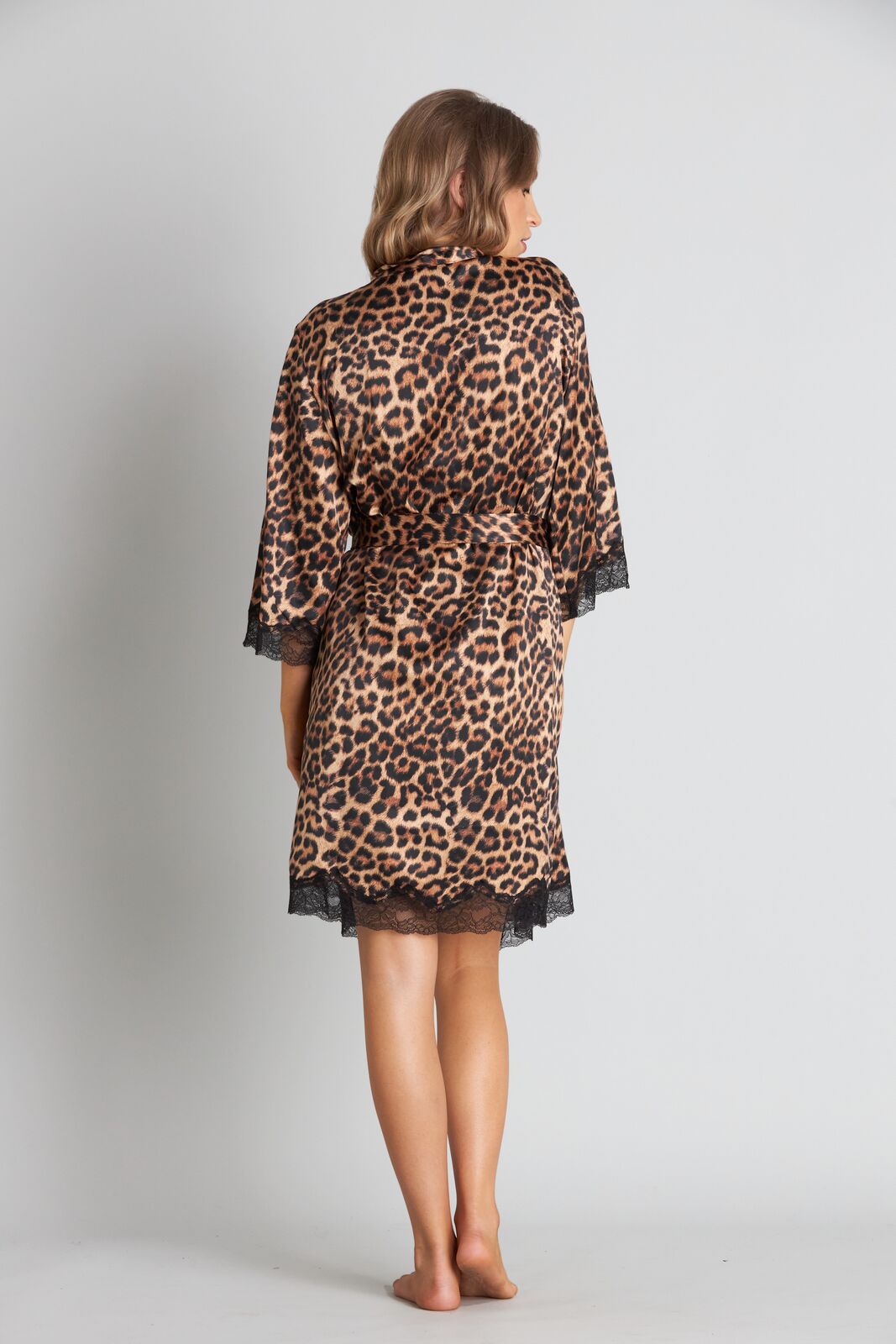 Model wears Noele Robe in LEOPARD/BLACK. On body back view