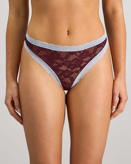 Model wears Leo Thong in FIG/SKYWAY. On body front view