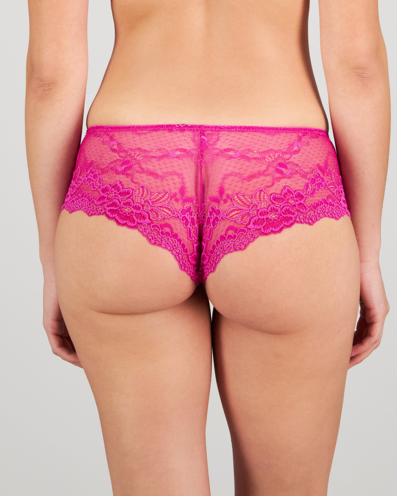 Model wears My Fit Lace Brazilian in FANTASY FUCHSIA. On body back view