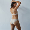 Model wears Stripe Elastic & Papertouch Tanga in SILVER PEONY. On body back view