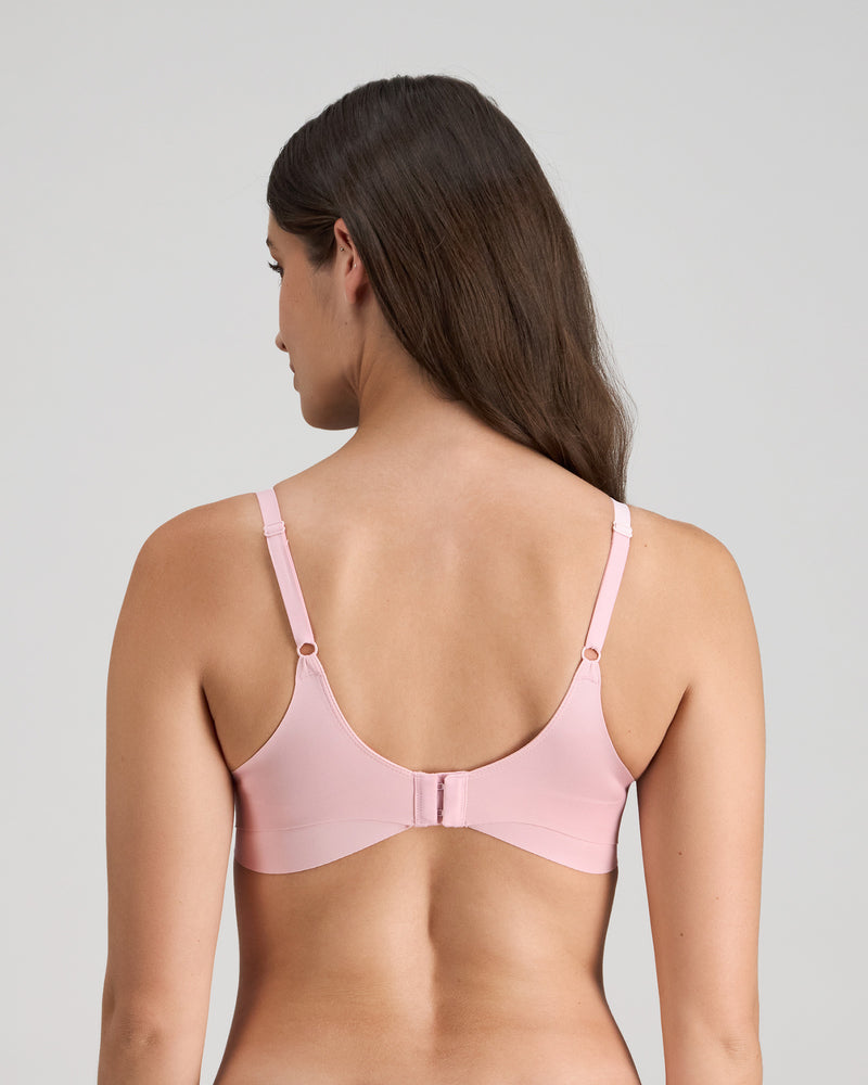 Model wears Flawless Form Contour Bra in ICY PINK. On body back view