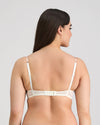 Model wears Sofia Underwire Bra in CAMEO. On body back view