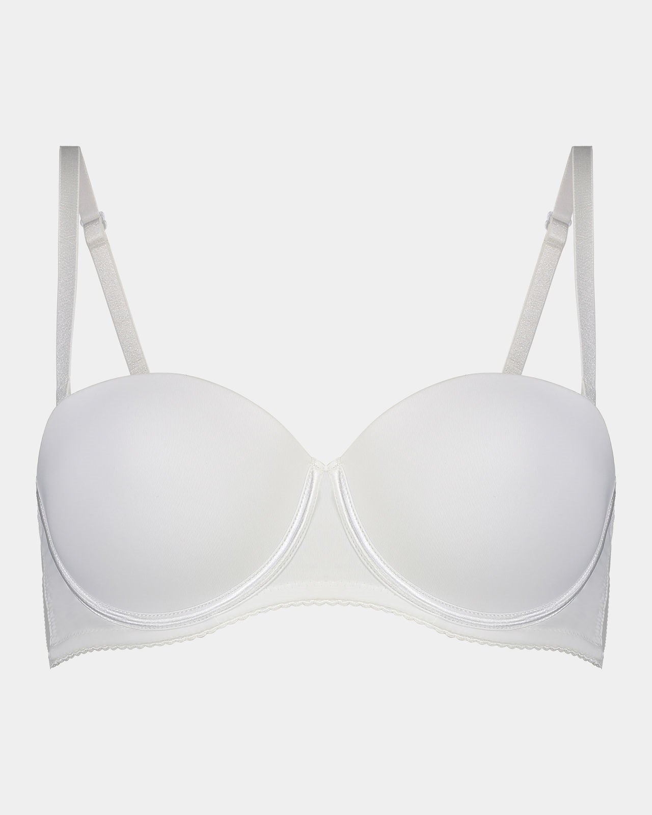 Model wears Body Basics Strapless Bra in WHITE. On body front view