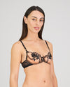 Model wears Niara Underwire Bra in BLACK. On body side view