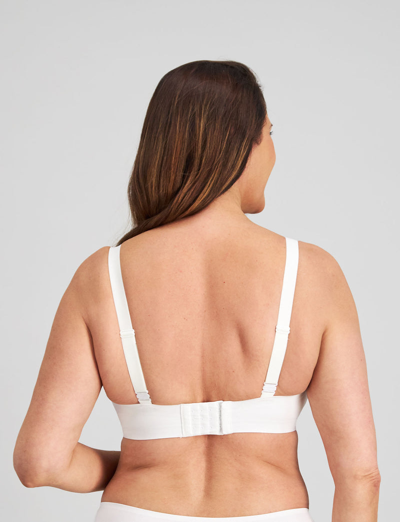 Model wears Comfit Collection Wire Free Bra in WHITE. On body back view