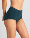 Model wears Body Cotton Full Brief in PONDEROSA PINE. On body side view