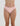 Model wears Stretch Cotton Thong in ICY PINK. On body front view