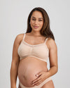 Model wears Bendon Nurture Maternity Bra in LATTE. On body side view