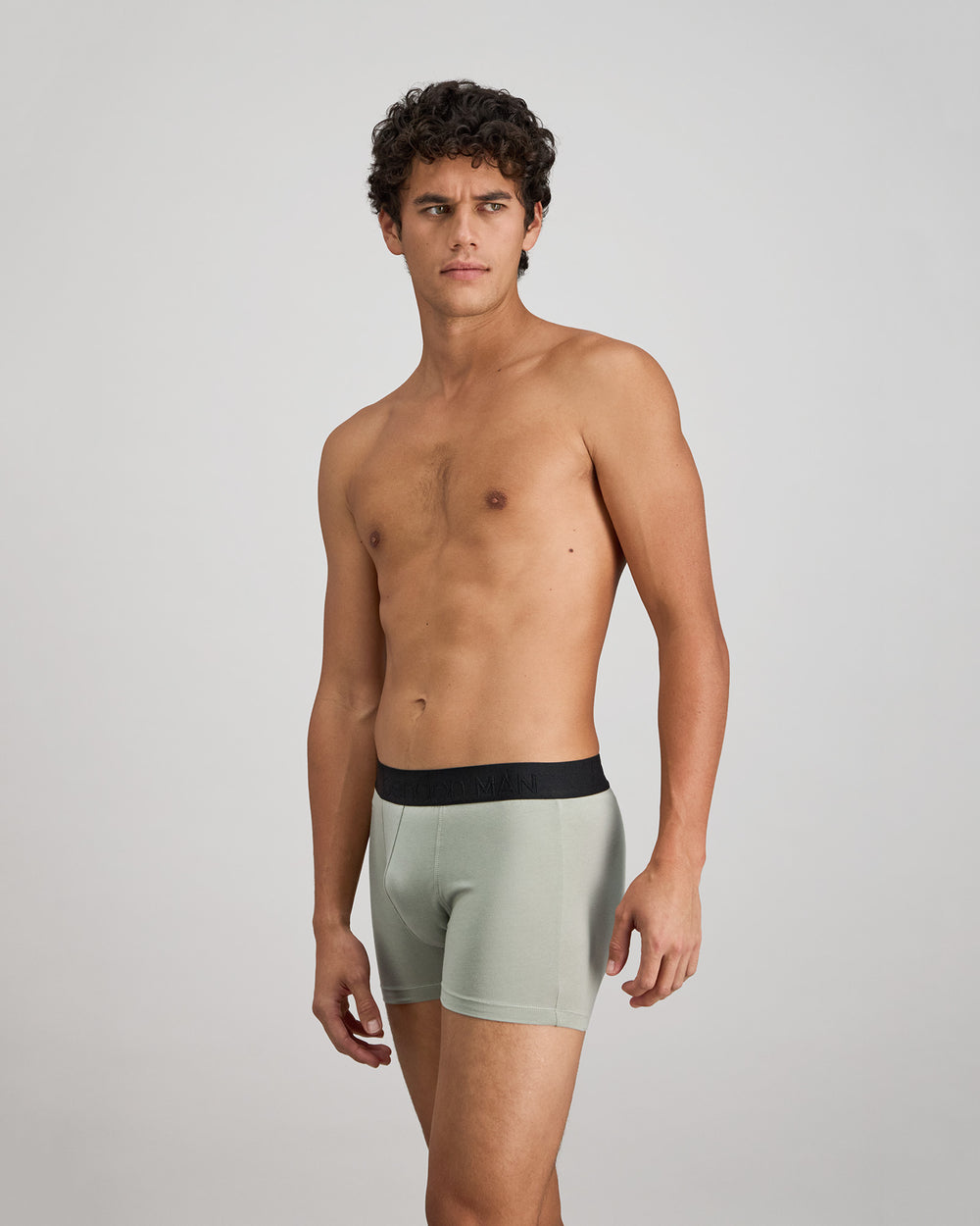 Everyday Essential Mens Trunk in ICEBERG GREEN. Flat lay back view