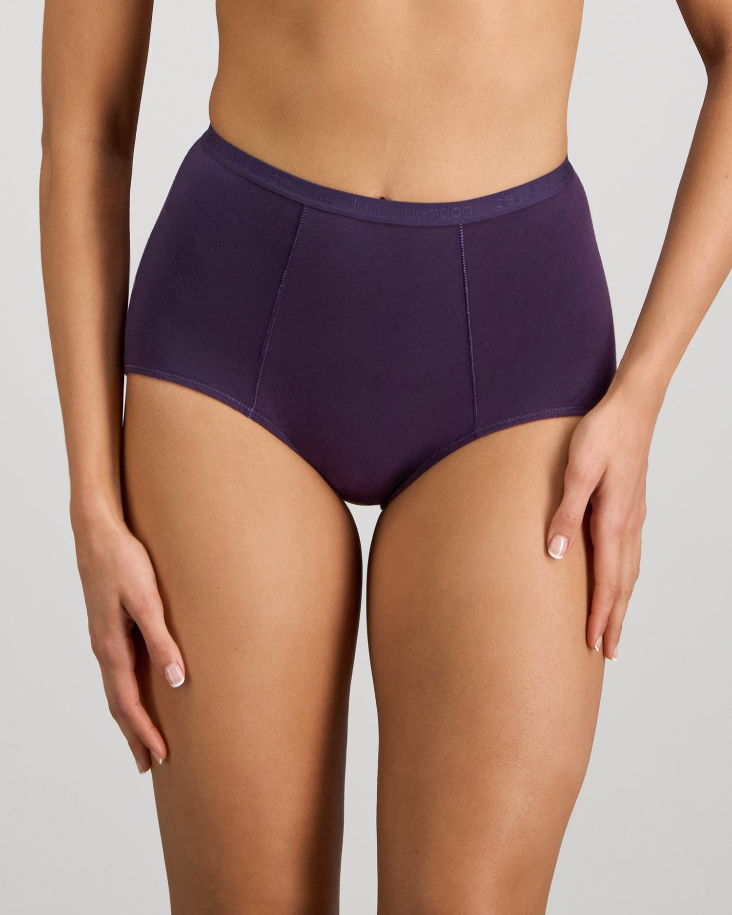 Model wears Body Cotton Full Brief in PURPLE VELVET. On body front view