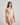 Model wears Extra-Ordinary Bodysuit in LATTE. On body side view