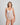 Model wears My Fit Lace Bodysuit in WHITE. On body front view