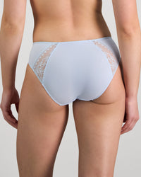 Model wears Amplify High Cut Brief in SKYWAY. On body back view