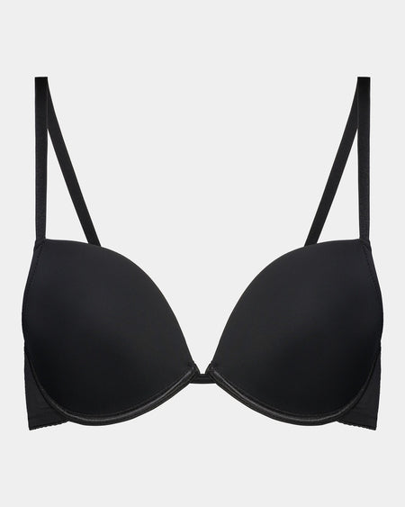 Model wears Body Basics Push Up Bra in BLACK. On body front view