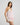 Model wears Dreamer Camisole in PALE LILAC. On body side view