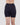 Model wears Smoothing Bodywear Chafer Short in BLACK. On body back view