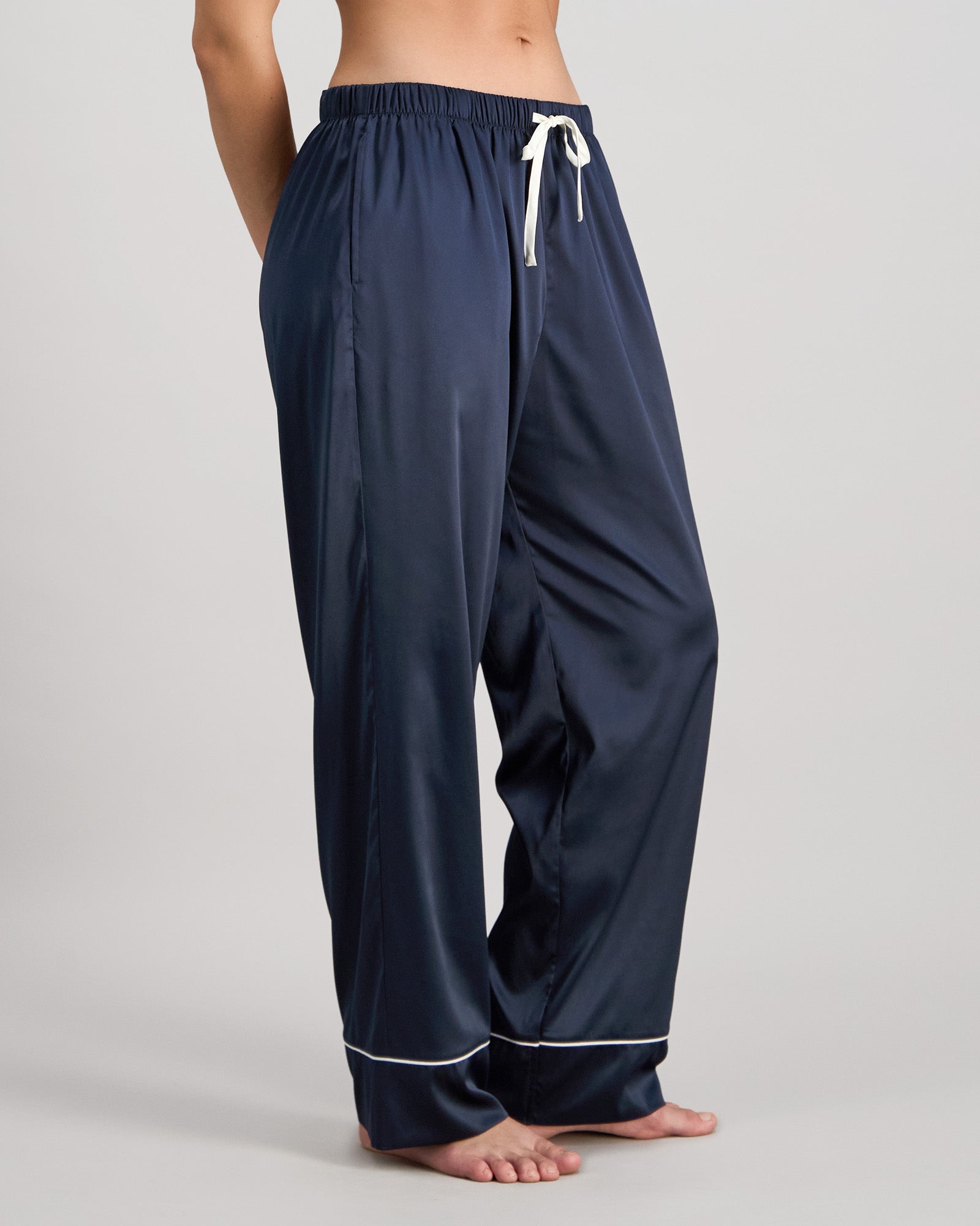 Model wears Holly Long PJ Pant in NAVY BLAZER. On body side view