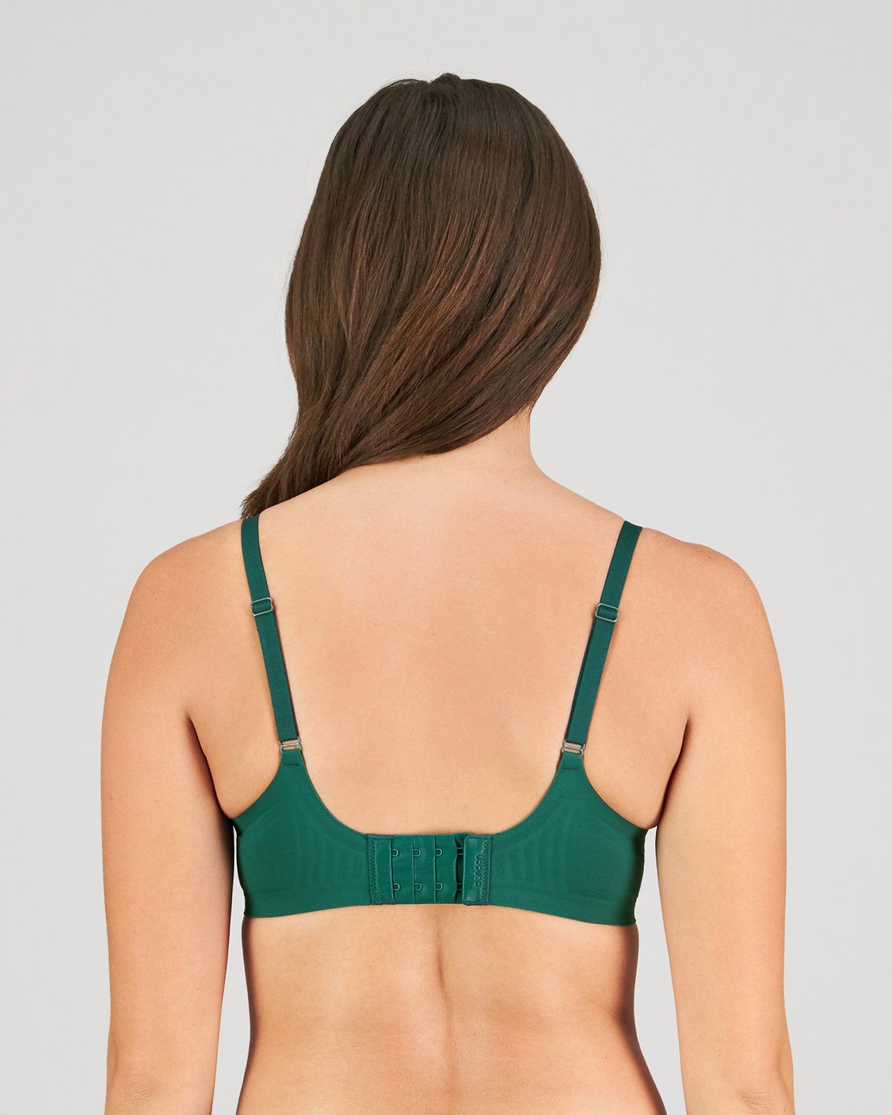 Model wears Comfit Collection Contour Bra in RAIN FOREST. On body back view