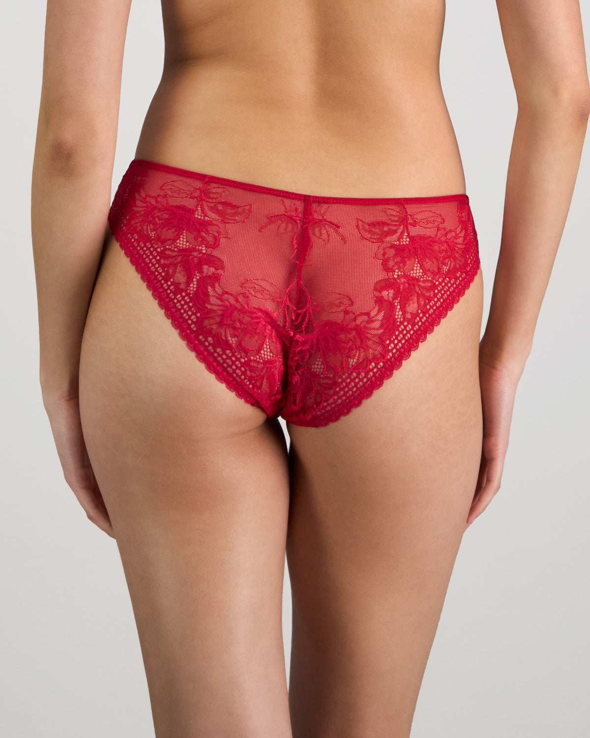 Model wears Lucille Bikini in JAZZY. On body back view