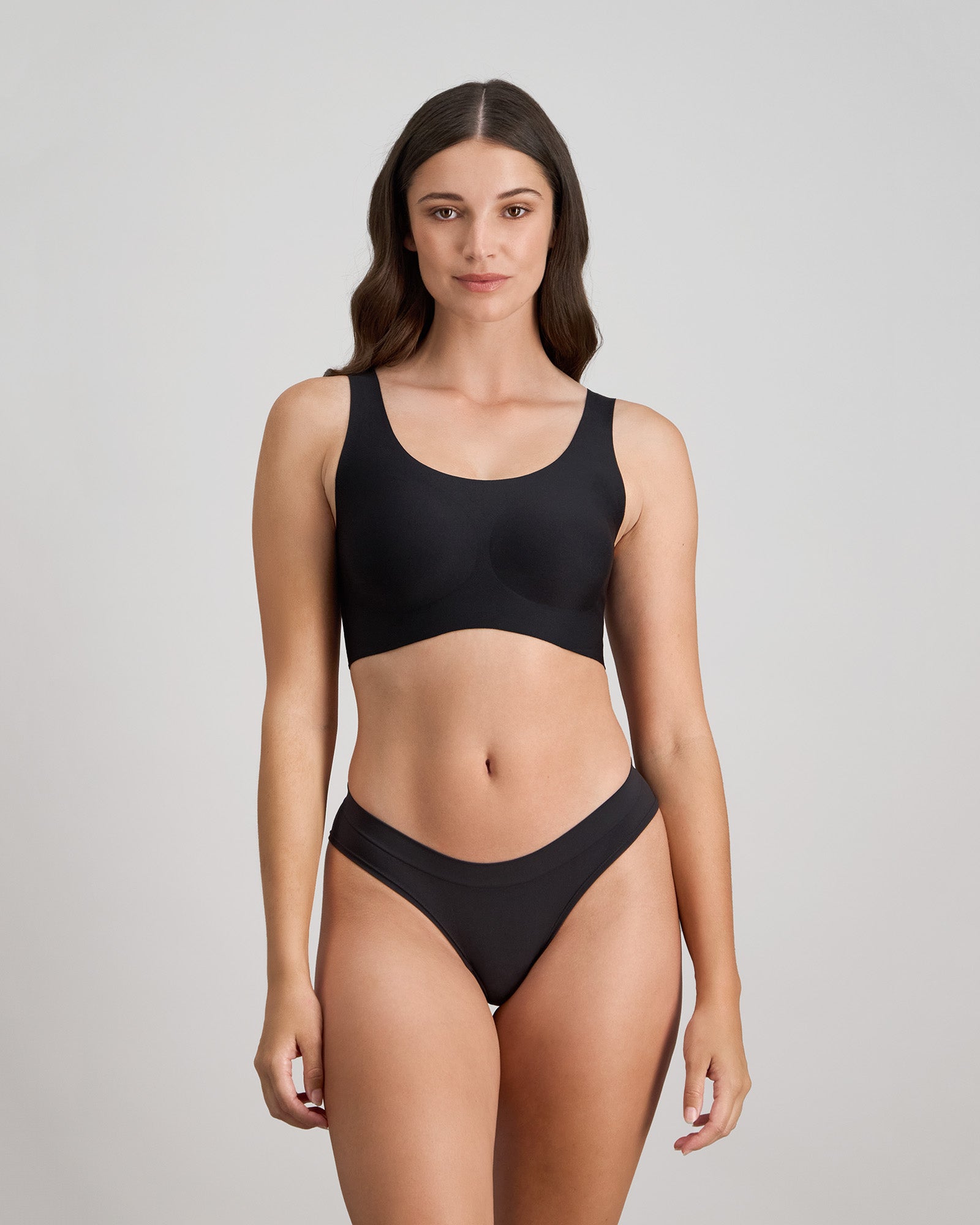 Comfit Collection Crop Top in BLACK. Flat lay back view