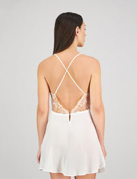 Model wears Eros Chemise in SUGAR. On body back view