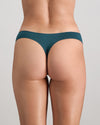 Model wears Au Naturel Thong in MEDITERRANEA. On body back view