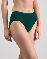 Model wears Body Cotton High Cut Brief in RAIN FOREST. On body side view