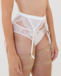 Model wears Una Elegance Bikini in SUGAR. On body side view