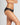 Model wears Sofia Bikini in BLACK. On body side view