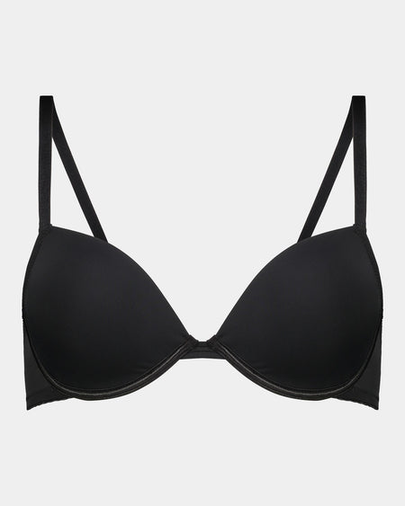 Model wears Body Basics Contour Bra in BLACK. On body front view