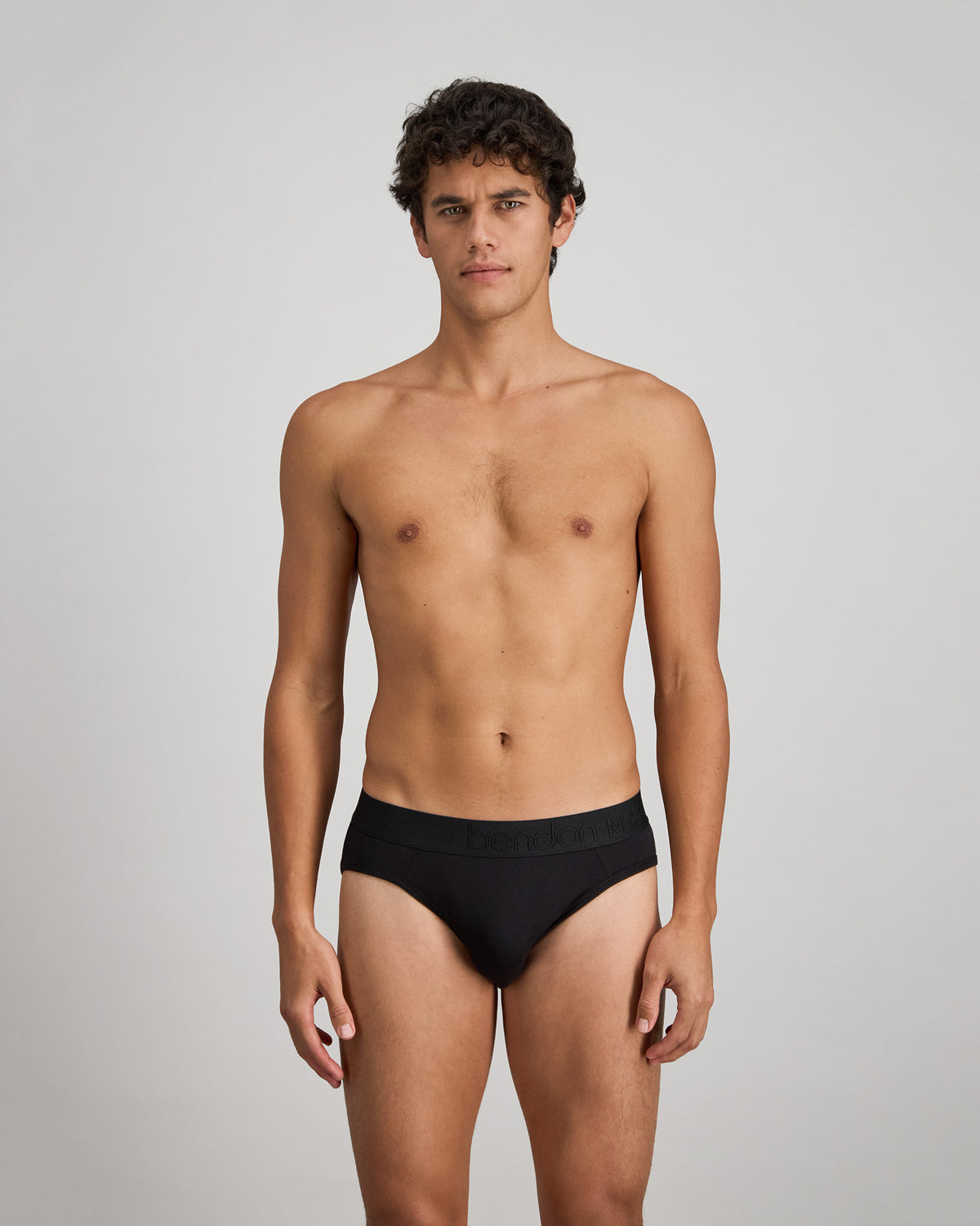 Bamboo Mens Brief in BLACK. Flat lay back view
