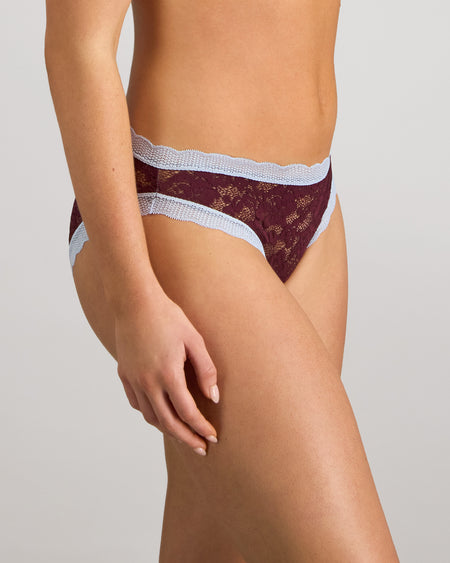 Model wears Leo Bikini in FIG/SKYWAY. On body side view