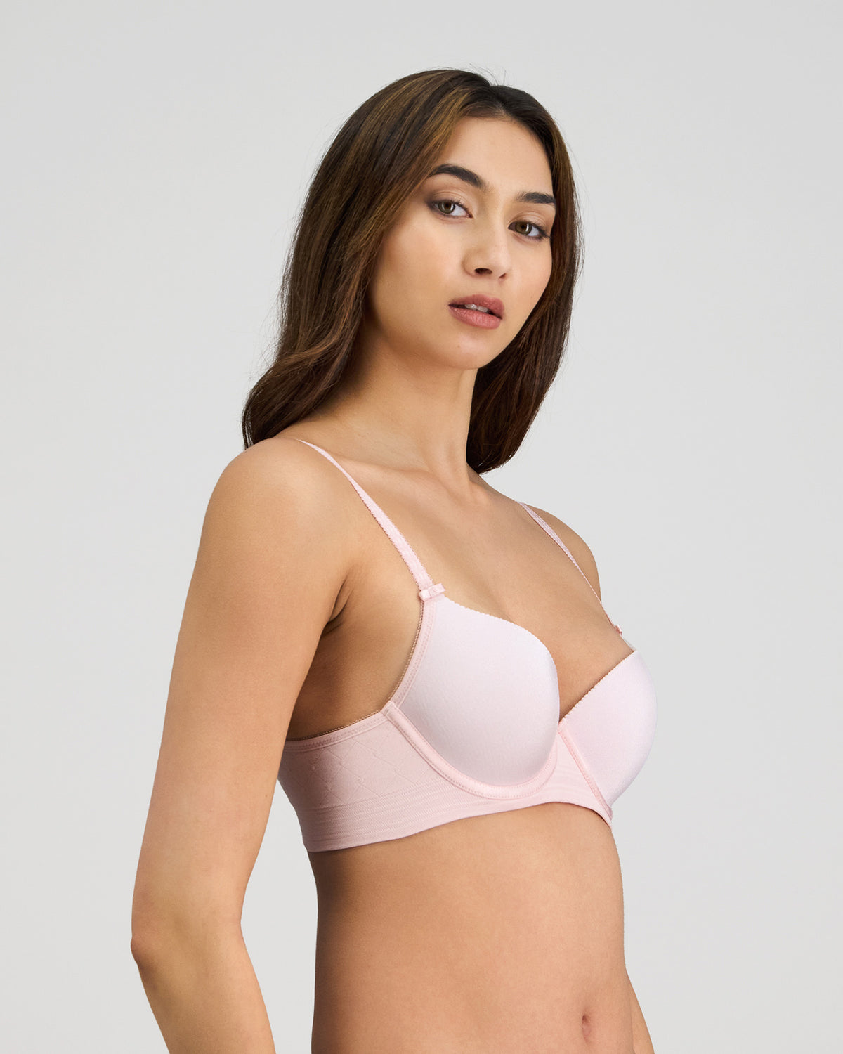 Model wears Bendon Body Contour Bra in PALE LILAC. On body side view
